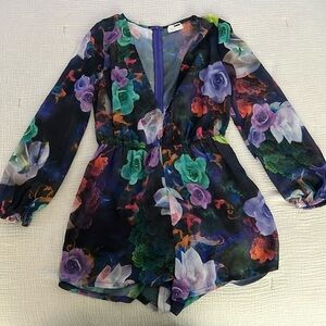 purple romper with colorful flowers